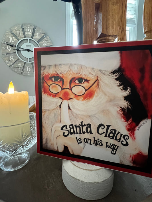 SANTA CLAUS IS ON HIS WAY